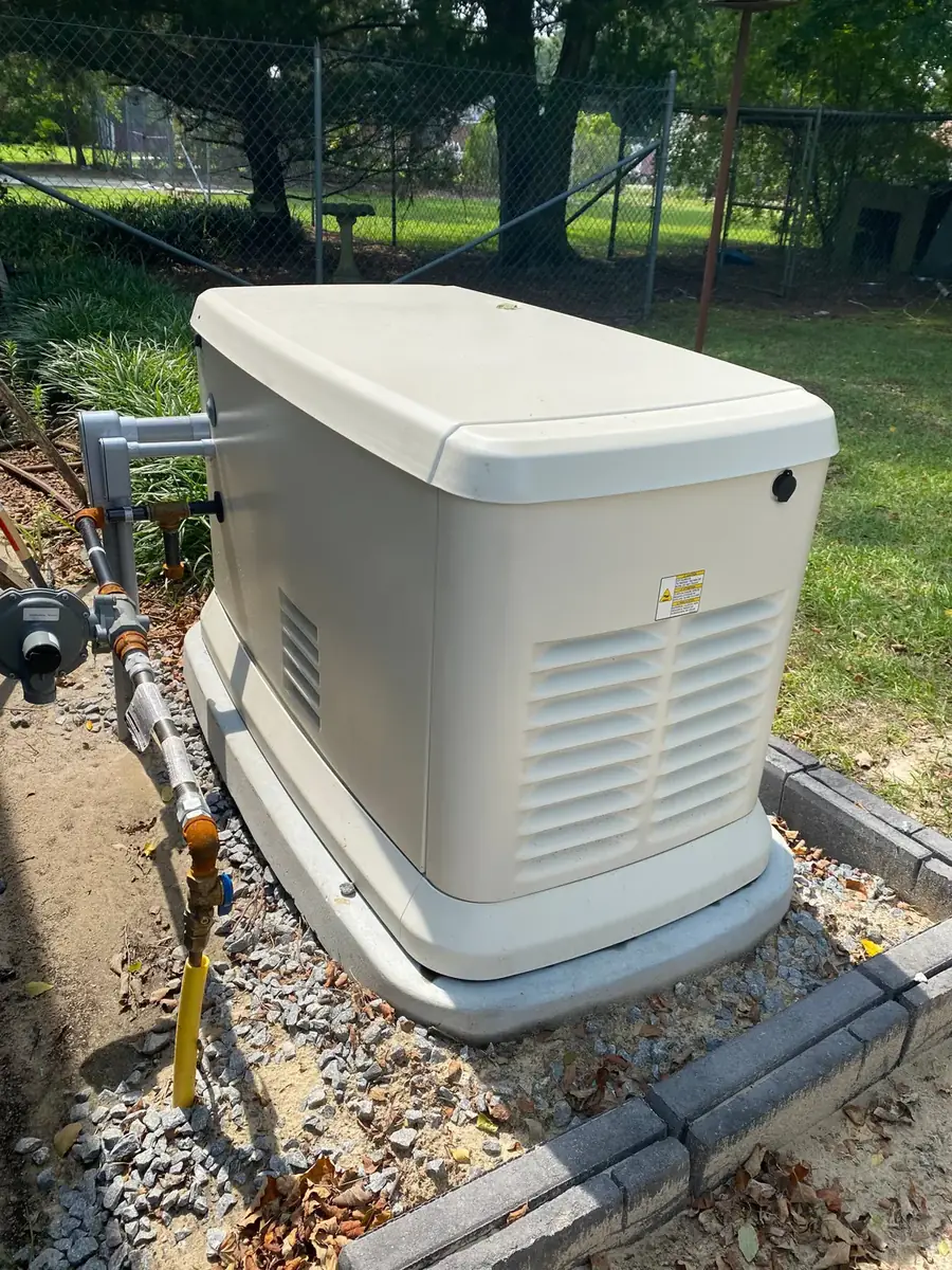 Generac home standby generator on its pad with gas connection, installed by CDS